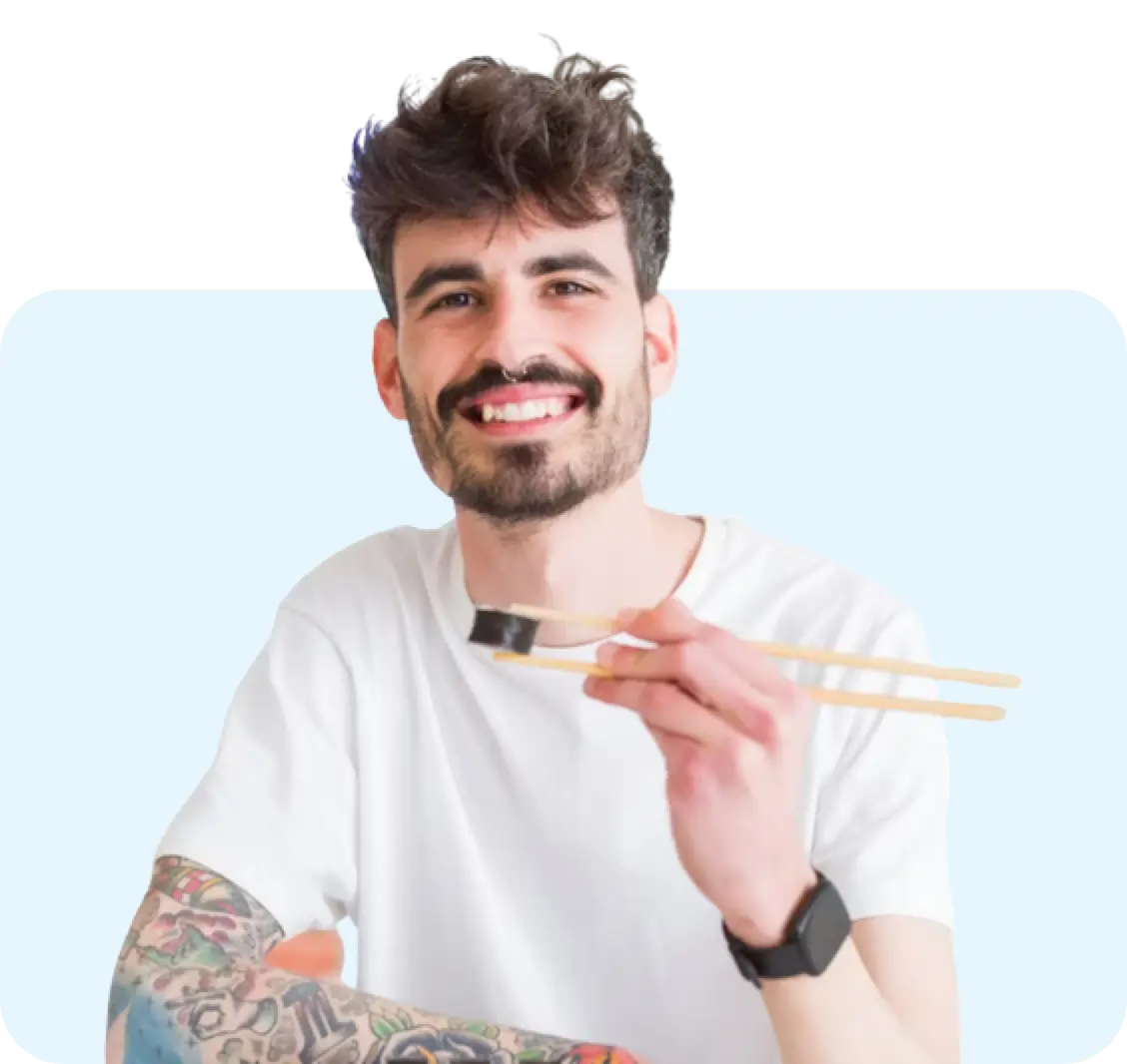 A man eating a sushi